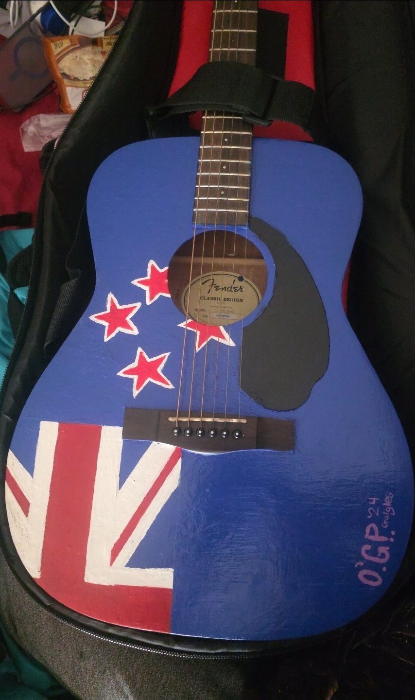 NZ Flag Guitar — an acoustic guitar painted with the New Zealand flag